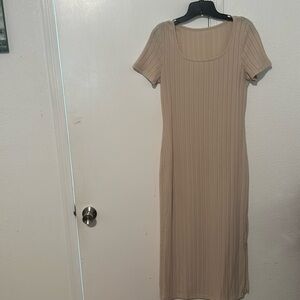 Very cute tan colored brand new dress never worn with slit on